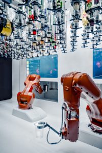 Industrial robots deployed in a manufacturing factory